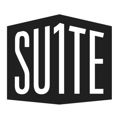 Suite 1 Logo | A black polygon on white ground with white letters that say SU1TE in a sans-serif font.